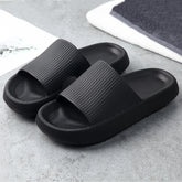 Comfortable CheapSeasons cloud slippers and flip-flops with non-slip soles and extra soft cushioning for indoor and outdoor wear.