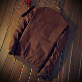 Color-block statement jacket from CheapSeasons featuring vintage vibes and urban rugged style with earthy tones and a modern fit.