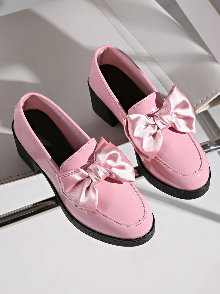 Pink Lackloafer with satin bow by CheapSeasons, featuring a glossy finish and stylish design for a chic look.