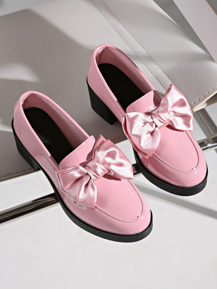 Pink Lackloafer with satin bow by CheapSeasons, featuring a glossy finish and stylish design for a chic look.