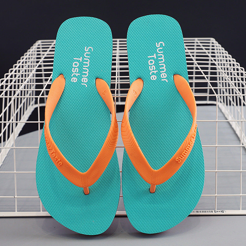 Pair of CheapSeasons flip flops in vibrant summer colors, casual footwear perfect for warm weather and beach outings.