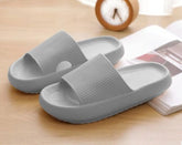 Cloud slippers and flip-flops by CheapSeasons with non-slip soles and extra soft cushioning, ideal for comfortable indoor wear.