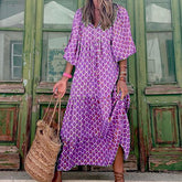 Green floral boho maxi dress by CheapSeasons, featuring a lightweight, airy summer design with flowing fabric and bohemian style.