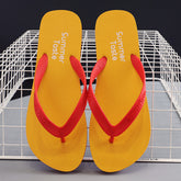 CheapSeasons flip flops with colorful straps, casual summer footwear, suitable for beach or poolside wear.