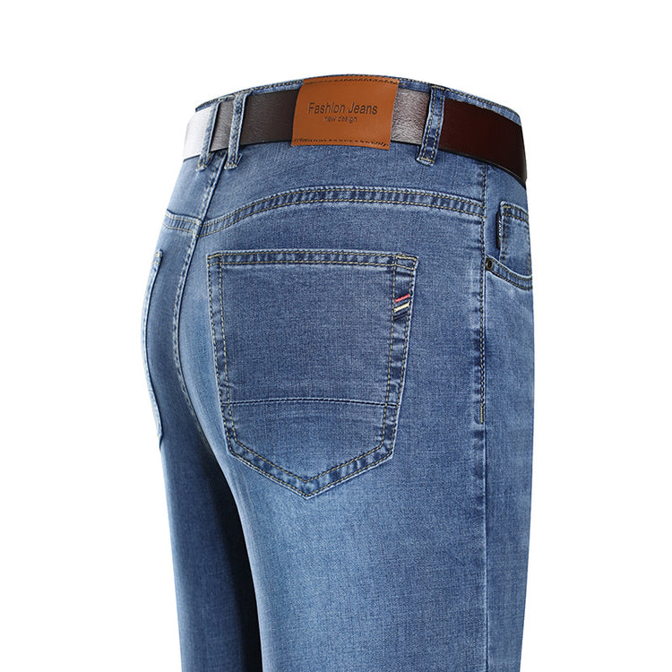 Premium straight jeans by CheapSeasons featuring a classic fit and comfortable design, shown in a natural denim color.