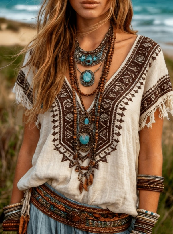 Boho-ethno shirt with tassel details by CheapSeasons, featuring colorful patterns and relaxed fit for a bohemian style.