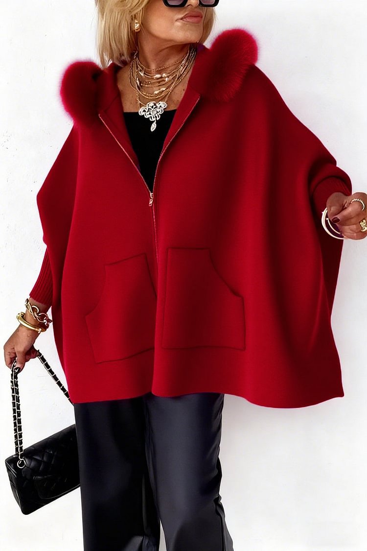 The luxury hooded cape with fur accent