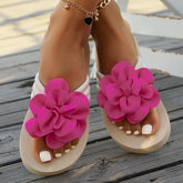 CheapSeasons Blumen-Slides with large fabric flower, open-toe sandals featuring a stylish floral accent on the straps