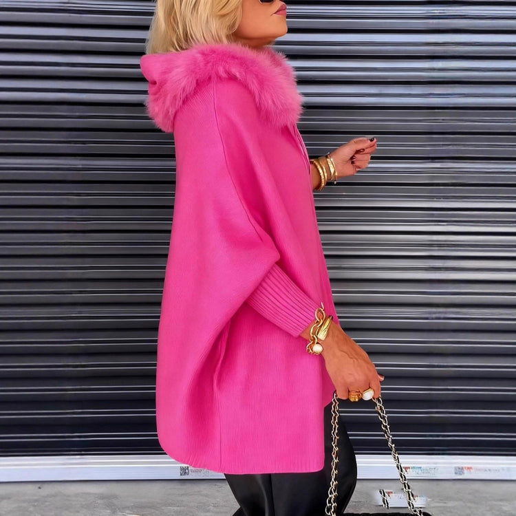 Luxurious hooded cape with fur accent from CheapSeasons, featuring a cozy design and elegant style in a natural fabric finish.