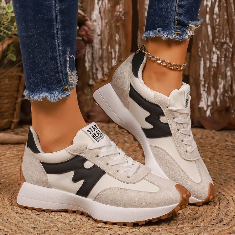 Hybrid sneaker by CheapSeasons featuring a modern design with bold colors and sleek style for a confident look.