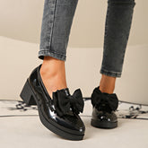 Pink Lackloafer with satin bow from CheapSeasons, featuring a shiny finish and stylish design for a chic, eye-catching look.