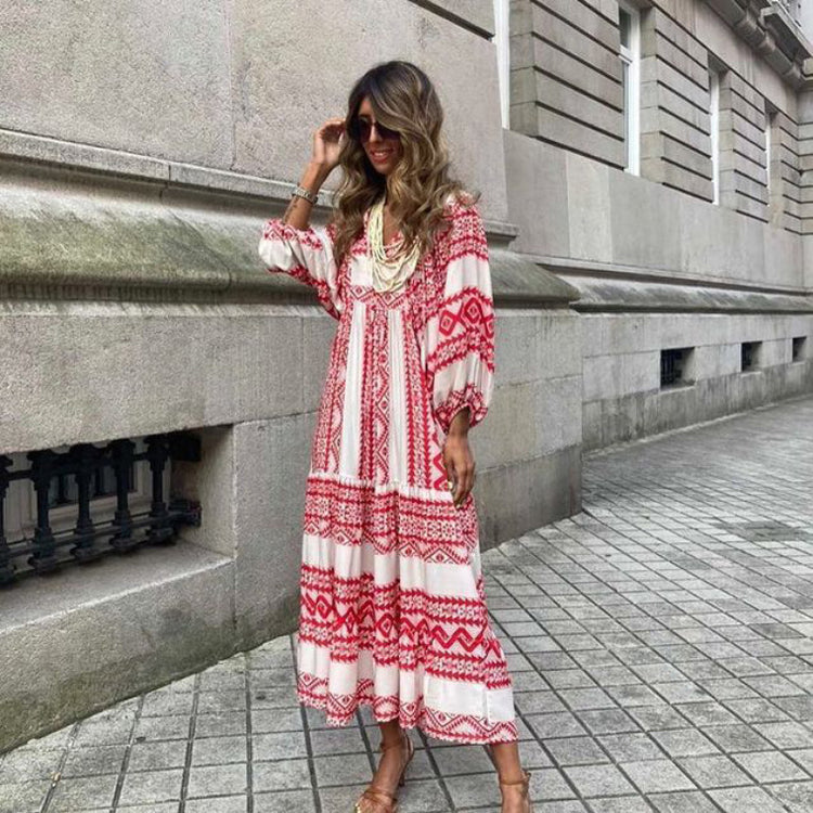 Green floral boho maxi dress from CheapSeasons, featuring a lightweight, airy summer design with flowing fabric and bohemian style.
