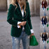 Close-up of a Velvet Elegance blazer from CheapSeasons showcasing its luxurious velvet fabric and tailored fit.
