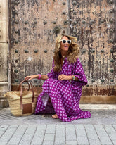 Green floral boho maxi dress from CheapSeasons, featuring a lightweight, airy summer design with flowing fabric and bohemian style.