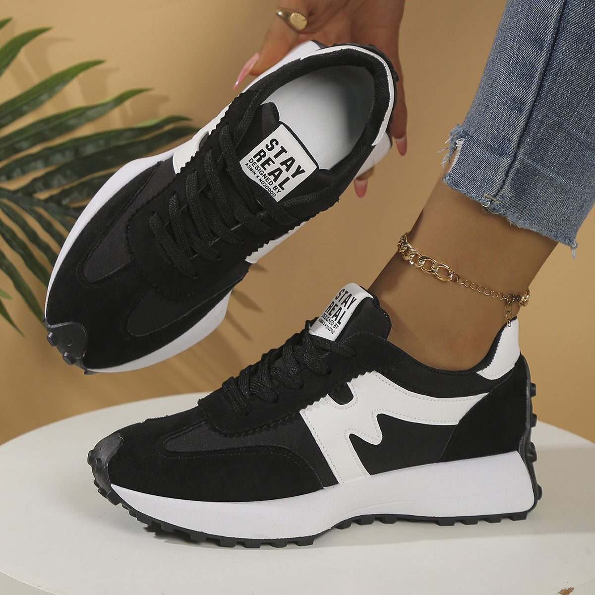 Hybrid sneaker by CheapSeasons featuring a stylish design with sleek materials and modern detailing for a confident look.